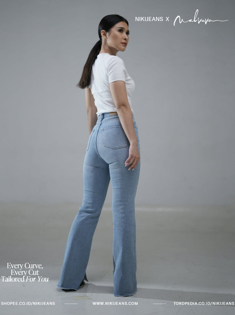 NIKi X MALVAVA Flare Light Blue Slit Highwaist Jeans